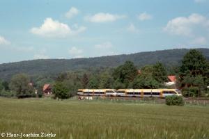 Talent DMUs in double traction, 
traveling through a rural area.